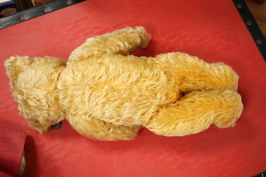 An English 1930s teddy bear and a Paddington Bear by Gabrielle Designs with original labels